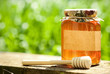Flowery honey in glass jar Flowery honey in glass jar