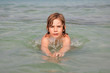 little girl swimming in the sea little girl swimming in the sea