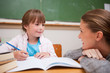 A teacher and a schoolgirl talking
