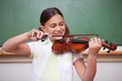 Schoolgirl playing the violin