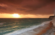 Fiery sunset on the Dorset coat in England Fiery sunset on the Dorset coat in England