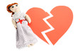 Voodoo doll girl on the broken heart isolated on white