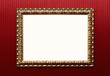 Blank vintage gold frame over red wallpaper with path Blank vintage gold frame over red wallpaper with path