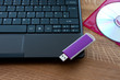 Laptop, USB drive and CD
