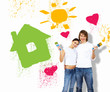Young couple with paint brushes together
