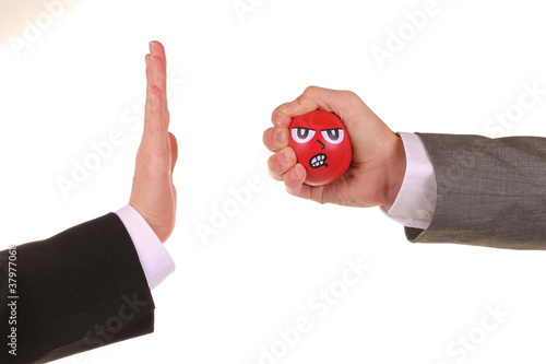 Foto: Wutanfall Hände roter Stressball Wutanfall Hände roter Stressball