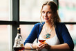 Woman with a cognac