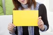 young Woman with blank panel for advertising and text