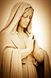 Vintage sepia image of a suffering religious woman praying Vintage sepia image of a suffering religious woman praying