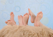 children's feet over furry blanket