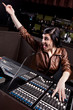 Soundboard technician doing a sound check