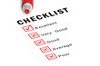 Checklist with red marker and checked boxes.