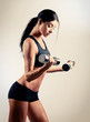 Photo: woman with dumbbells woman with dumbbells