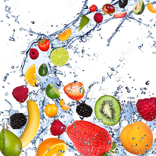 Photo: Fruits falling in water splash, isolated on white background Fruits falling in water splash, isolated on white background