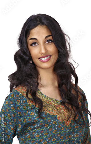 Photo: Beautiful young lady with warm friendly smile Beautiful young lady with warm friendly smile