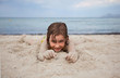 little girl on sandy beach little girl on sandy beach