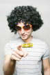 funny guy in afro wig with eyeglasses and ribbon bow