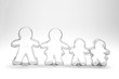 Family silhouettes together, made of baking pans Family silhouettes together, made of baking pans