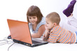 siblings playing with notebook