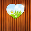 holiday background on Valentine's Day with a heart and a wooden holiday background on Valentine's Day with a heart and a wooden