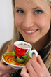 young girl with a cup of coffee
