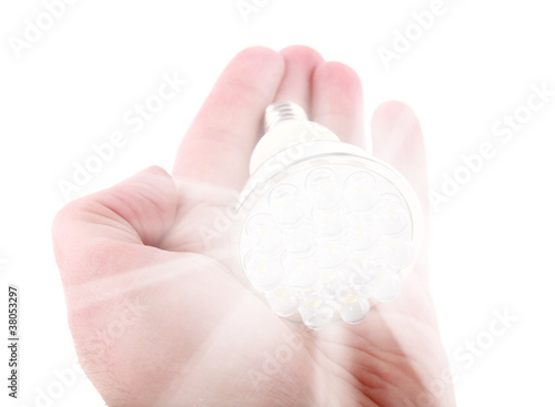 Photo: Led light bulb in hand Led light bulb in hand