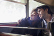 Serene couple hugging on bus