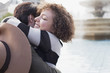 Couple hugging near fountain