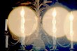 A grainy layered illustration of a chandelier A grainy layered illustration of a chandelier