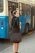 young business woman hurry on public transport