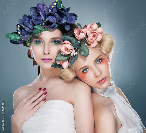Photo: Two graceful nymphs - lovely brunette and pretty blonde touching Two graceful nymphs - lovely brunette and pretty blonde touching