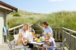 Photo: Family on vacation eating outdoors Family on vacation eating outdoors