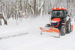 winter snow removal a small tractor