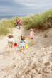 Foto: Family having fun on beach vacation Family having fun on beach vacation