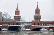 Winter view of Oberbaum Bridge across the Spree river in Berlin