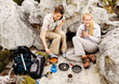 Two young women prepares something to eat