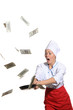 surprised woman-cook frying pan catches money surprised woman-cook frying pan catches money