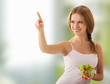 beautiful young  woman  with a salad choose healthy food