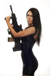 Photo: Sexy woman with weapon on white background Sexy woman with weapon on white background