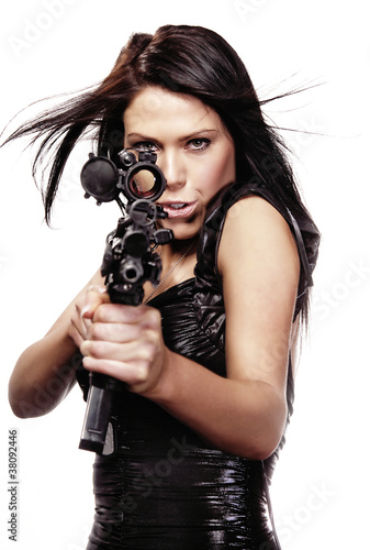Photo: Sexy woman with weapon on white background Sexy woman with weapon on white background