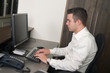 Male worker at a helpdesk