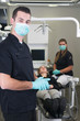 Photo: Dentist with nurse and patient Dentist with nurse and patient