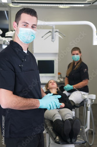 Photo: Dentist with nurse and patient Dentist with nurse and patient