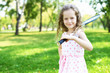 Little girl in summer park