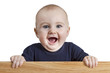 Foto: young child holding wooden board young child holding wooden board
