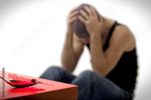Photo: addict and syringe addict and syringe
