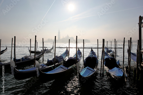 Photo: Venice in evening with gondolas in Italy Venice in evening with gondolas in Italy