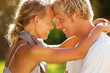 Happy young couple outdoors.