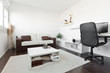 Photo: Modern living room with computer desk and the screen, sofa and t Modern living room with computer desk and the screen, sofa and t