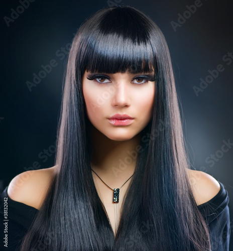 Photo : Beautiful Brunette Girl. Healthy Long Hair Beautiful Brunette Girl. Healthy Long Hair